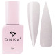 Nail top DNKA Cover Top No. 017 Athens, milky with shimmer, 12 ml